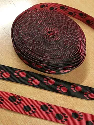 Popruh polypropylenový 25 mm, černý podklad - červená tlapka, oboustranný, galanterie, met