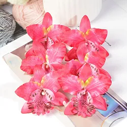 Orchidea kvet, textilná dekorácia, bordový kvet